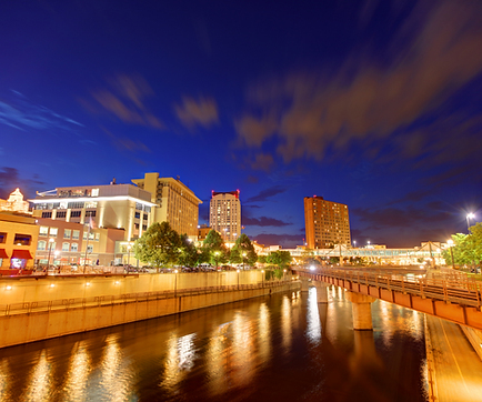 Ground-level view of a canal and downtown buildings in Rochester, Minnesota.