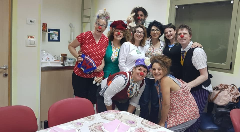 Medical clowning in Ashkelon, July 2018. That's me in red! Talia Safra, in the front row without the red nose, is our teacher. Photo by Eti Zilberberg