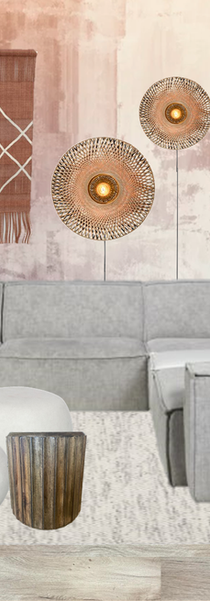 In de woonkamer adviseerde ik een abstract fotobehang in verschillende aardetinten en paste ik de meubels op deze kleuren aan. Door zachte en ronde vormen en ruwe, natuurlijke materialen te combineren creëer je een speels effect.