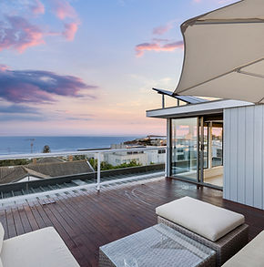 Upstairs outdoor lounge and deck overlooking the ocean at Dare to Dream Ocean Grove