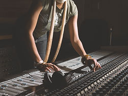 Woman Working at Mixing Console