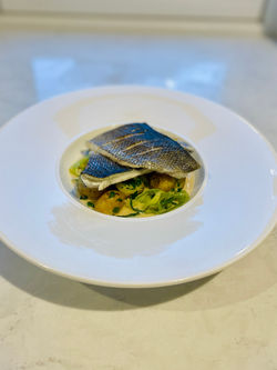Pan Fried Seabass with Parsley Tossed New Potatoes, Leek Confit, Marsh Samphire and a Noilly Prat Cr