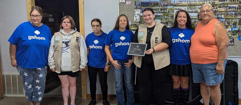 Club thanks Girl Scout Troup #30610 for their donation