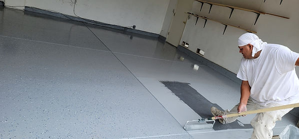 Garage flooring restoration- By Jacksonville Painting Brothers.