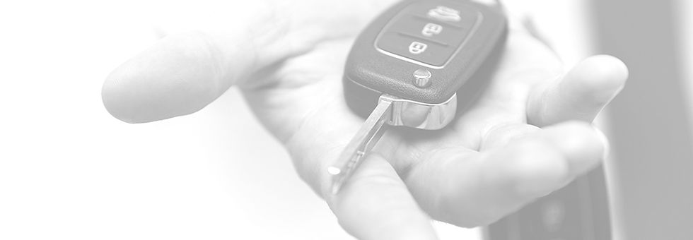car-key-in-hand_edited_edited.jpg