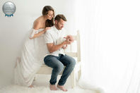 Family portrait in white studio setup – Hertfordshire award-winning newborn and family photographer.