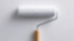 vecteezy_paint-roller-with-a-textured-white-cover-is-positioned_77621694.jpeg