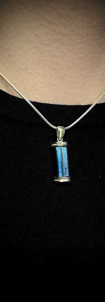 man wearing spectrolite jewelry