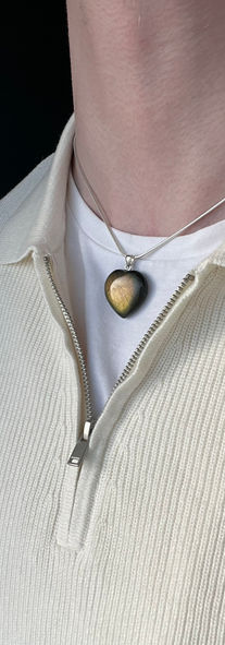 man wearing hope necklace spectrolite