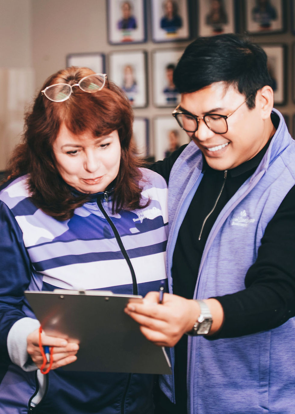 Bookkeepers looking at files