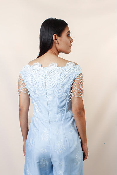 Thumbnail: powder blue jumpsuit with detachable cape