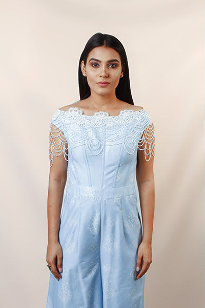 powder blue jumpsuit with detachable cape