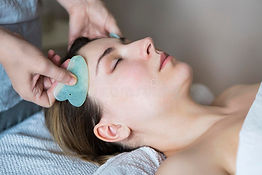 young-woman-have-face-treatment-beauty-clinic-women-guasha-asian-98924533.jpg