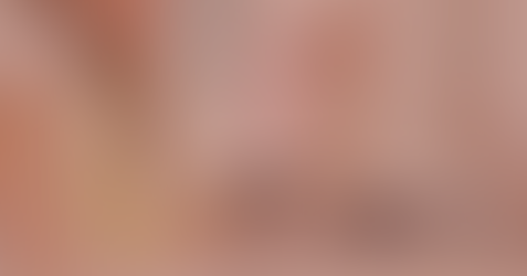 Eyeglasses sitting on a book.