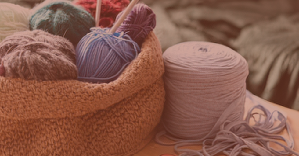 A basket of yarn can be connected to a current hobby or an ideal that isn't a part of your life.