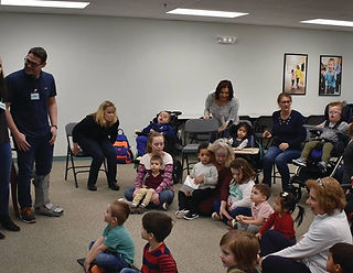 Co-founders Lauren and Harrison speaking to a class of students with disabilities