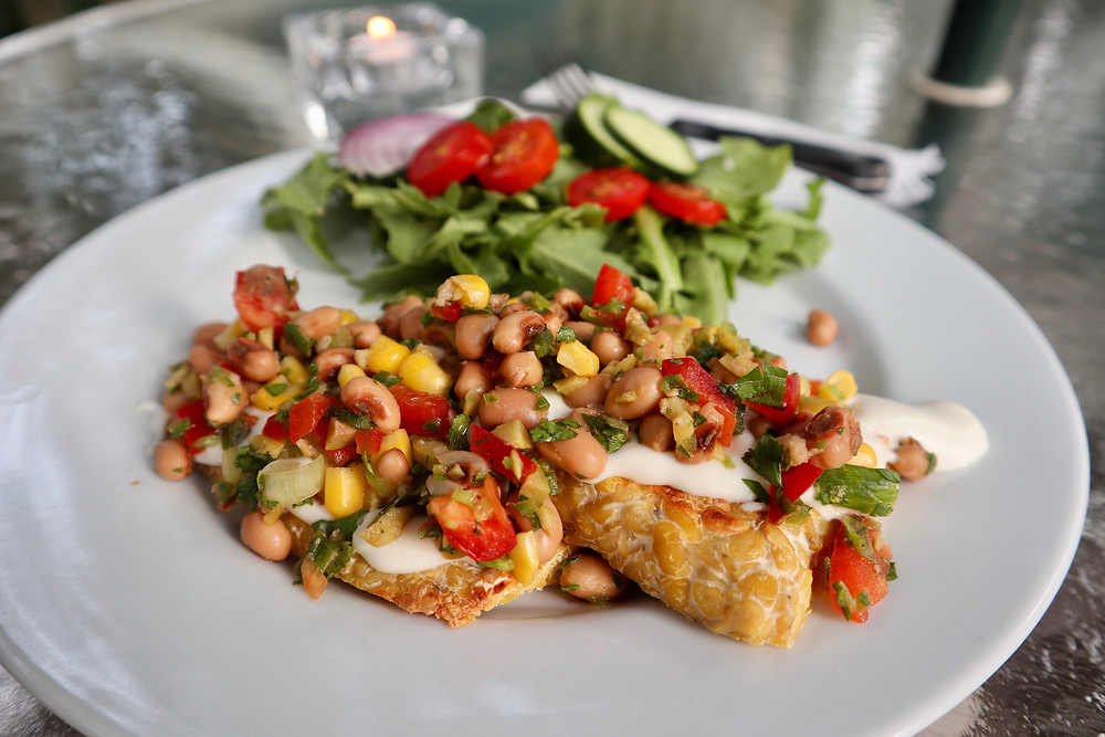 Tempeh with a Yogurt-Lime Sauce and Black-Eyed Pea Salsa made with black-eyed peas, corn, red pepper and jalapeño.