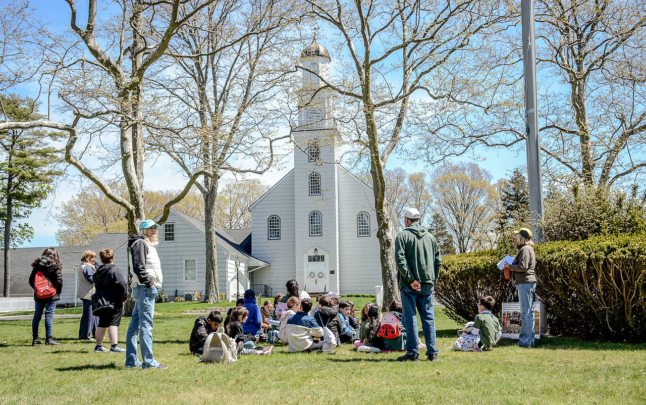 Students visiting the Setauket Village Green with volunteer docents. Photo by Rob Pellegrino