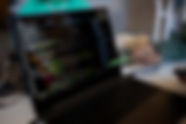 focus-on-laptop-screen-with-coded-data-and-pen-hel-2023-11-27-05-16-42-utc.jpg