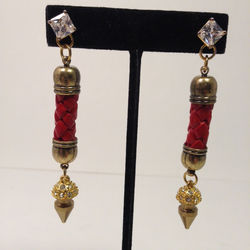 ER-LPSED. Red leather rope w/brass