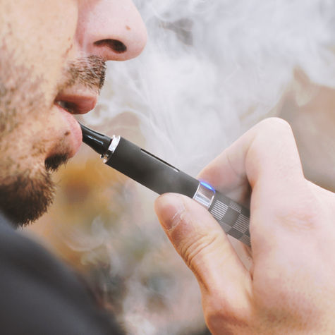 A man with an e-cigarette