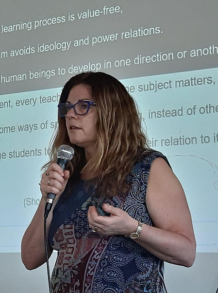 Dr Leticia Yulita delivering a conference presentation on intercultural language education