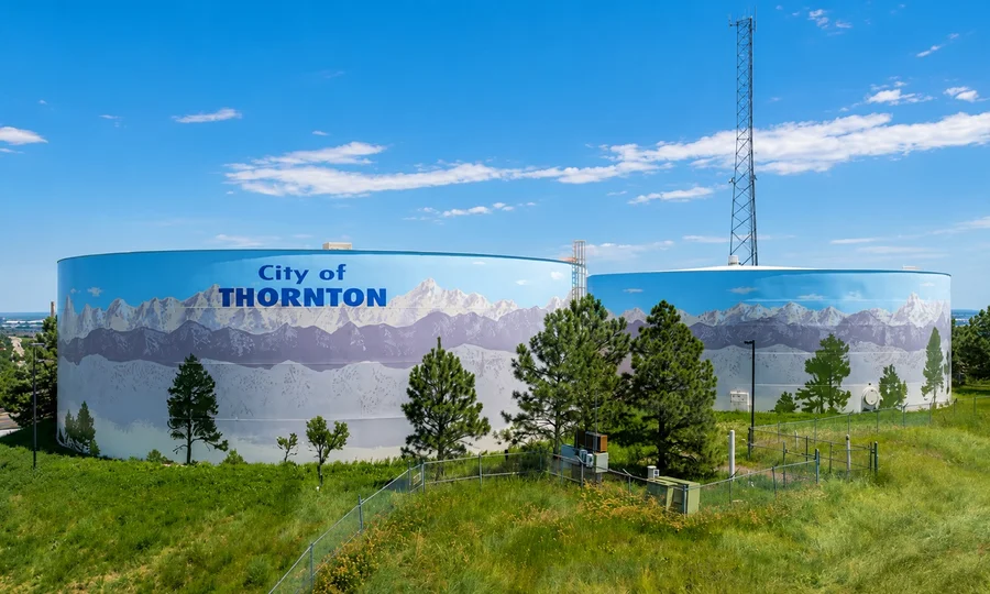 City of Thornton water tanks with mountain mural in Thornton, Colorado