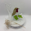 Thumbnail: beautiful fused glass robin perched on a branch