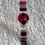 Thumbnail: cross in fused glass with rose detail