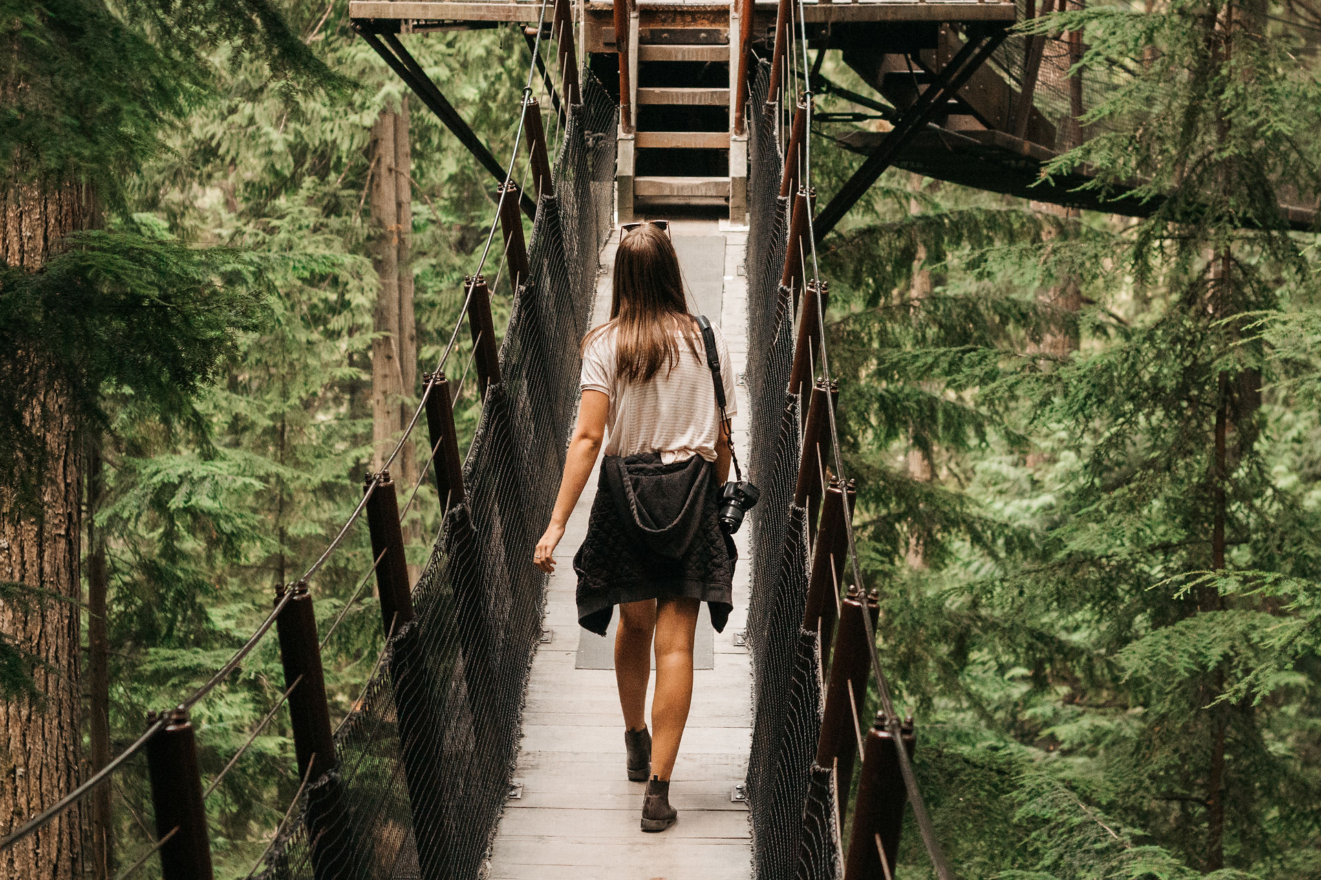 Girl on suspension bridge