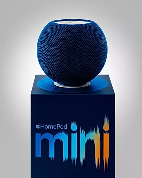 Apple HomePod mini speaker on its original packaging