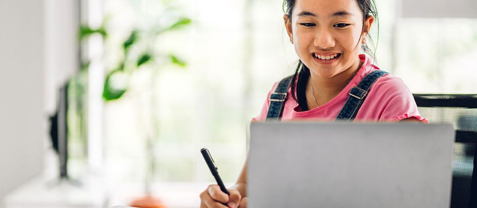 Young student learning online through a British Curriculum school