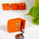 Thumbnail: orange dog tag silencer pouch