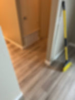 New laminate flooring meeting original wood floor