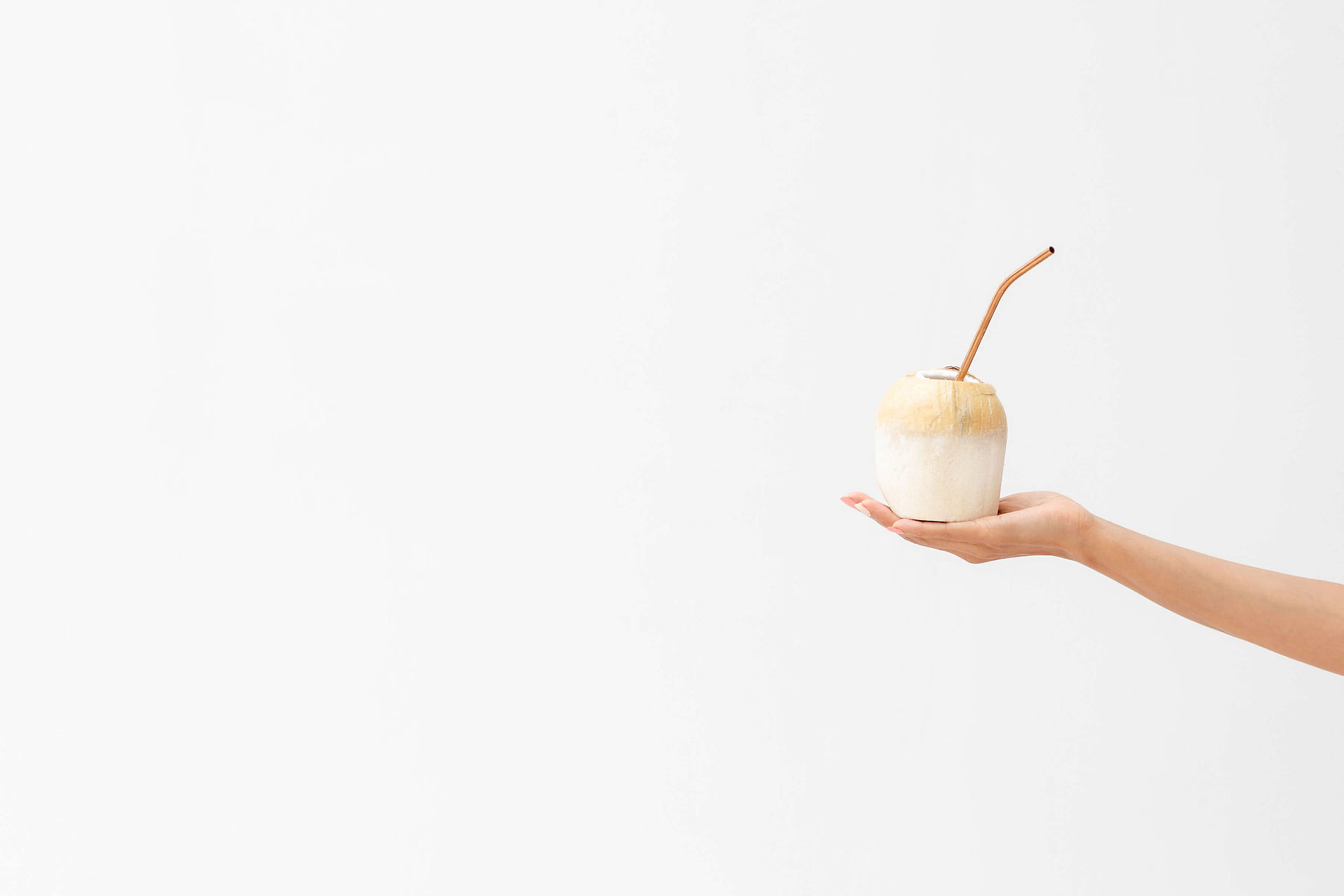 hand holding a beverage