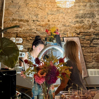 woman getting permanent jewelry put on
