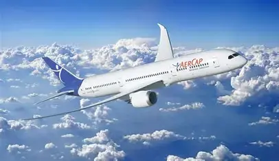 AERCAP jet flies above white clouds in a blue sky.