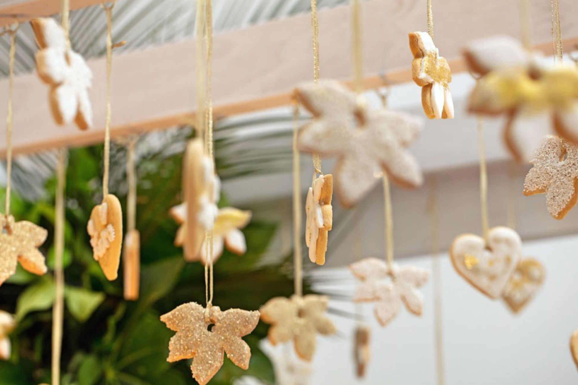 Gazebo adorned with hanging maple-glazed sugar cookies - Good Gracious Events - Event Partner