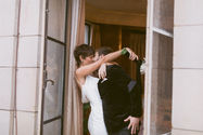 Wedding - Lindsay & Dan - Bride & Groom - Kissing at the penthouse balcony
