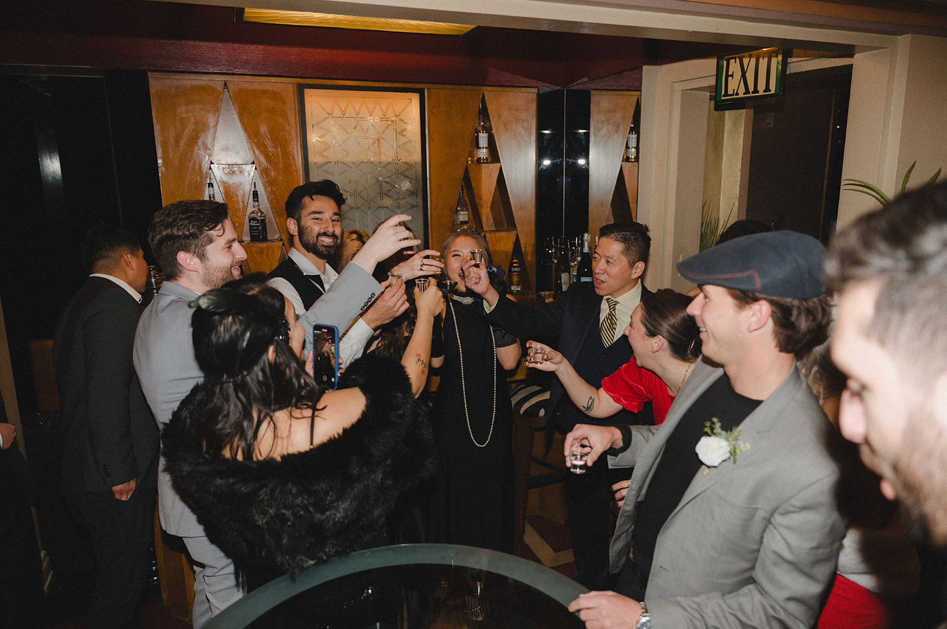 Group of guests raising their glasses.