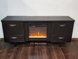desk turned tv stand with fireplace .jpg