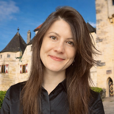 Woman with castle backdrop.png