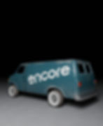 Blue touring van with large white Encore logo on the side, rendered in a studio-style 3D scene.