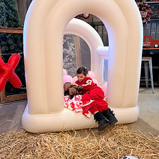 the real farmhers kid with baby goat the cuddle barn