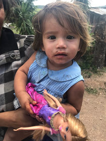 Little girl and doll.jpeg