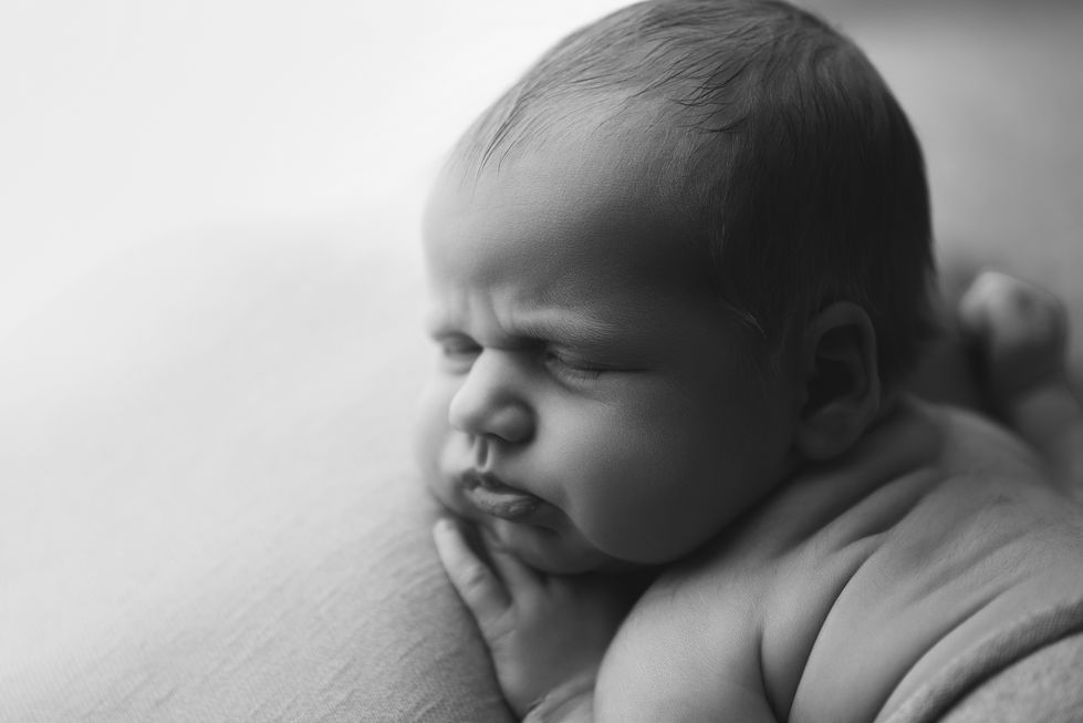 close up portrait of newborn baby's face
