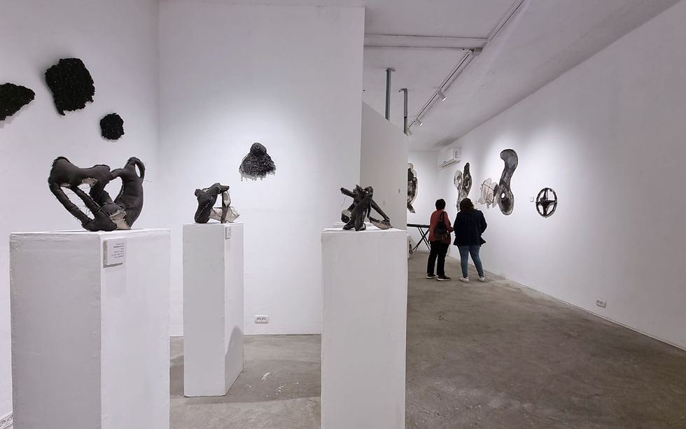 People wondering around the gallery space