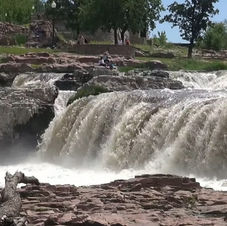 Falls Park at 13 minutes drive to the northwest of Kusek Family & Implant Dentistry Sioux Falls SD