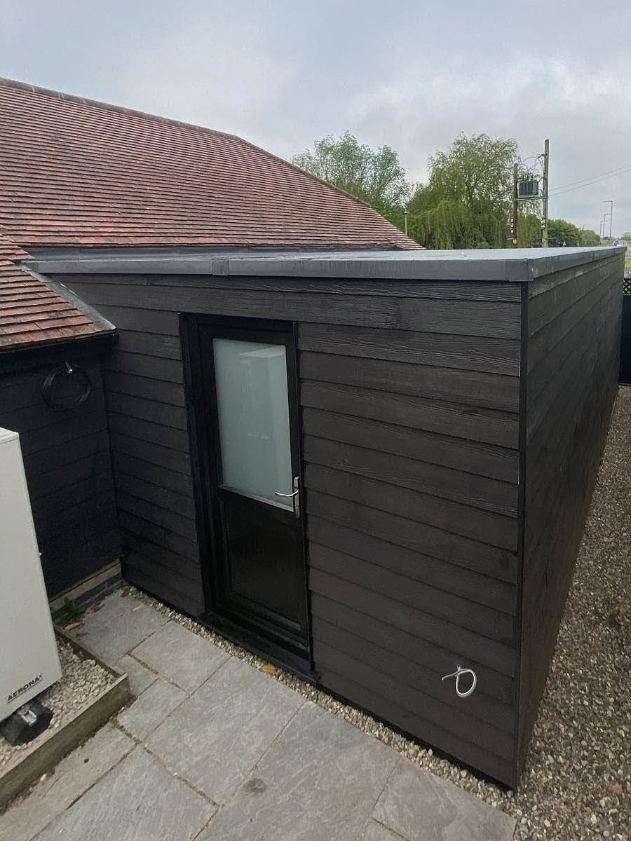 Modern dark timber extension as part of our work.