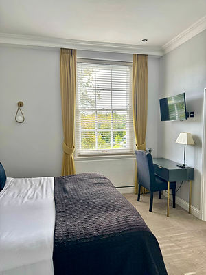 curtains intalled in the lilac room.jpg
